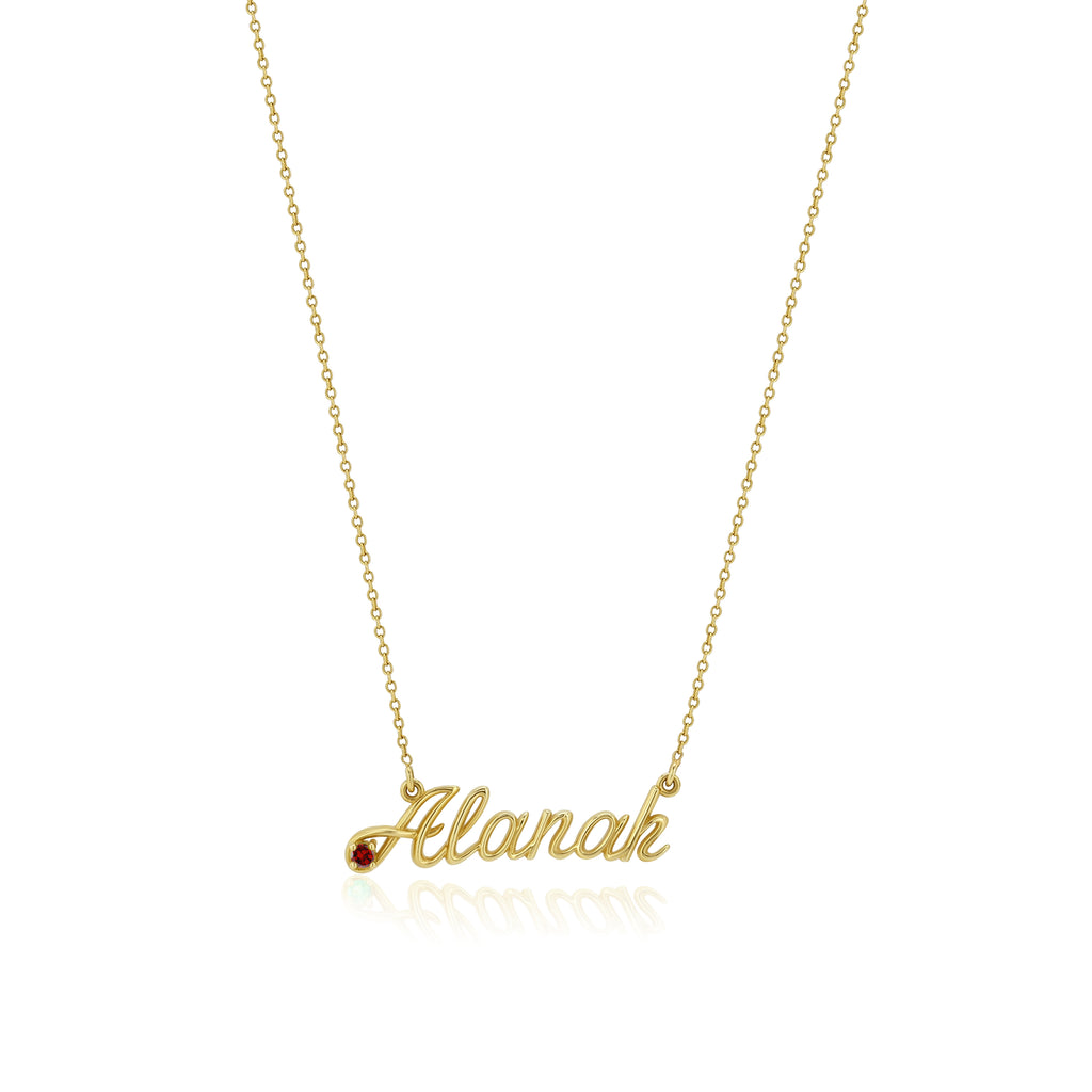Gold necklace with 'Alanah' pendant on a white background