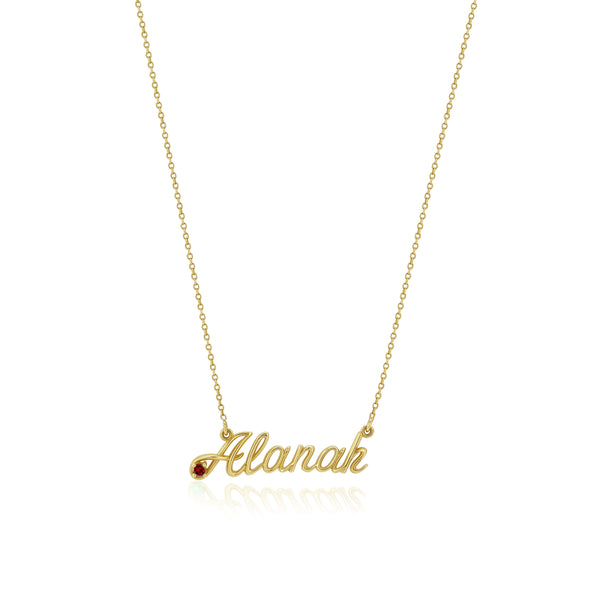 Gold necklace with 'Alanah' pendant on a white background